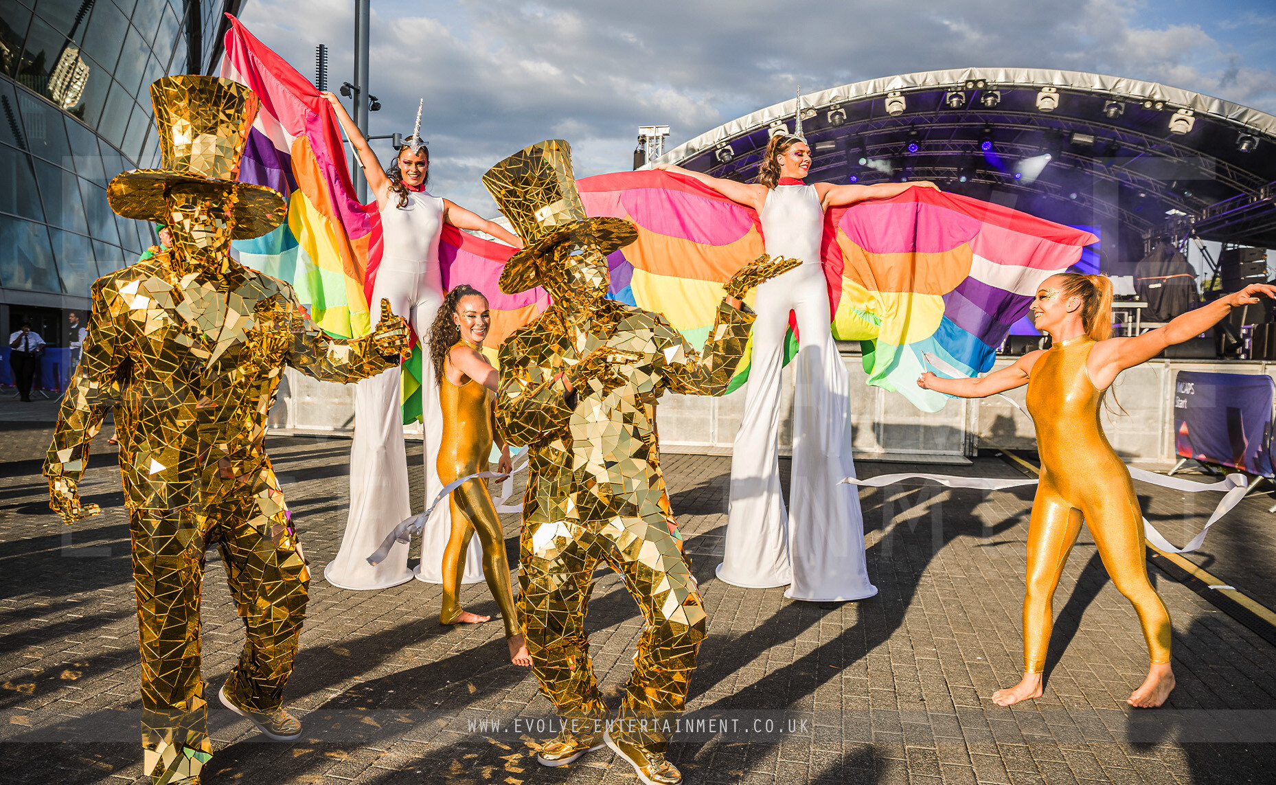 Gold Mirror Men, Golden Contortionists and Unicorn Stilts 1